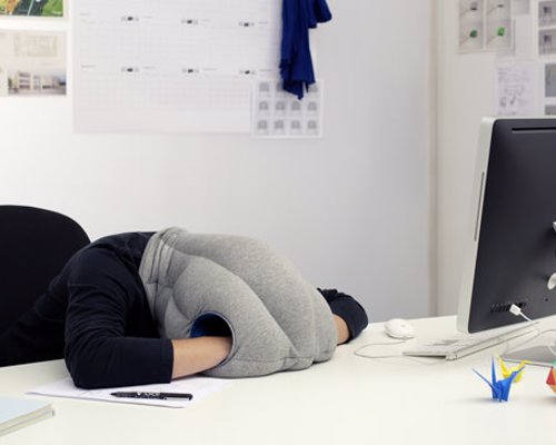 Ostrich Pillow - Nap Anywhere - Block out the outside world and catch a comfortable nap anywhere, any time
