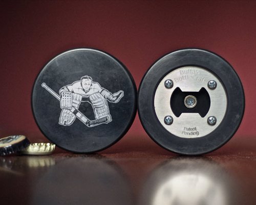 Real Hockey Puck Bottle Opener - A bottle opener made from a real hockey puck, magnetic to catch bottle caps