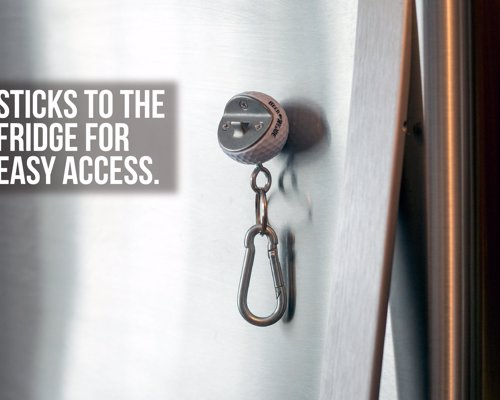 Real Golf Ball Bottle Opener - A bottle opener made from a real golf ball, sticks to your fridge via a magnet, or clips to your bag