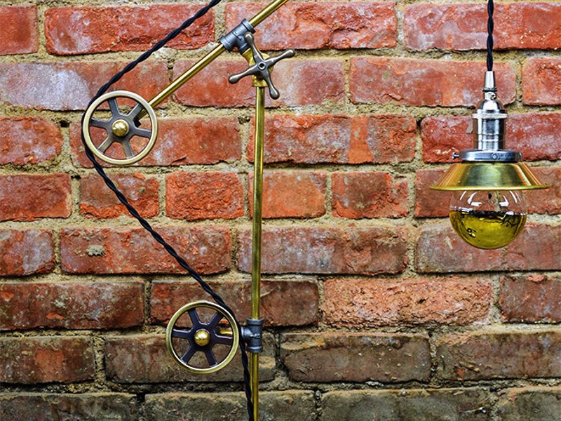 Industrial Pulley Table Lamp - Unique Steampunk/ Industrial lamp. Featuring 3 pulleys, with two-tone color feature of solid brass and antique nickel finish.
