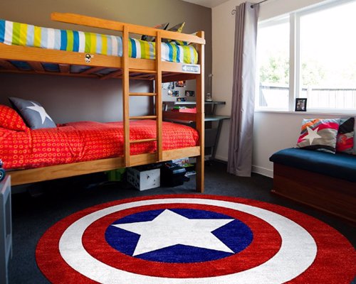 Captain America Rug - Captain America really likes his shield. So much so, that he's decorated his room with its design - including this rug