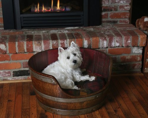 Wine Barrel Pet Bed By Wine Barrel Creations - Let your pooch snuggle up in this smart looking upcycled wine barrel, complete with fitted pillow