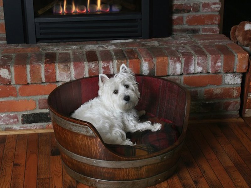 Wine Barrel Pet Bed By Wine Barrel Creations - Let your pooch snuggle up in this smart looking upcycled wine barrel, complete with fitted pillow