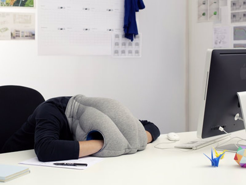 Ostrich Pillow - Nap Anywhere - Block out the outside world and catch a comfortable nap anywhere, any time