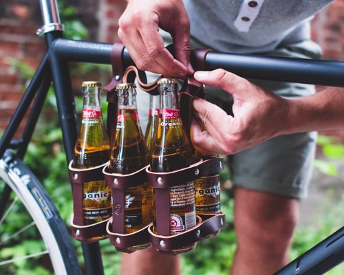 Leather Bicycle Six Pack Caddy - No need for bags or dangerous hand-carrying of your beers, with this handy six-pack bicycle beer caddy