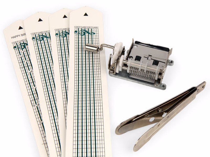 Make Your Own Music Box Kit - Punch holes in the paper strips to create your own music box melody
