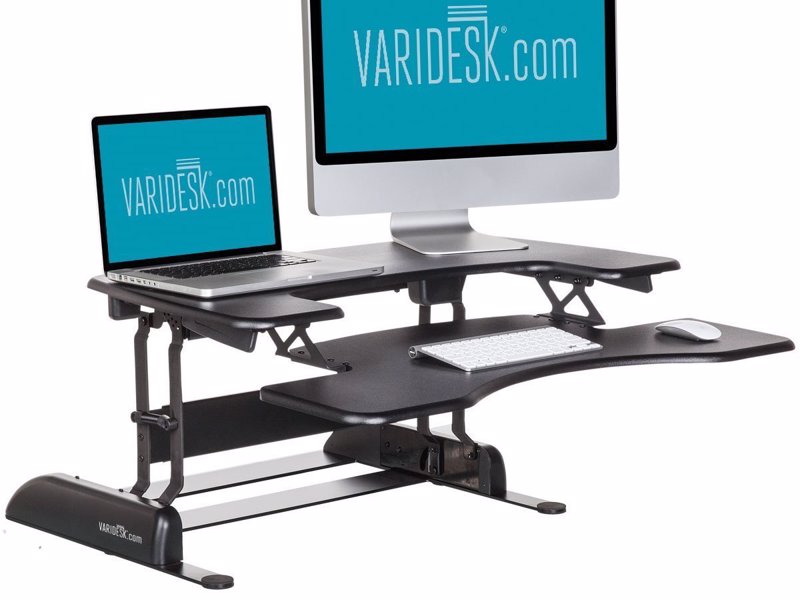Adjustable Standing Desk - Effortlessley switch between sitting and standing to improve your health, energy and productivity